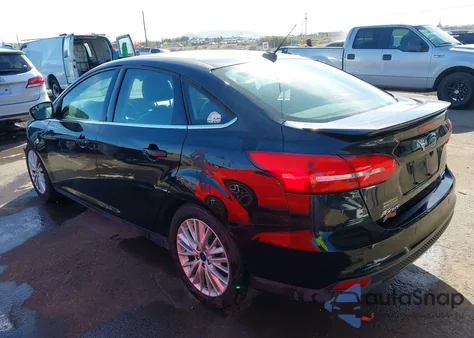 2015 Ford Focus Titanium from USA, damaged, VIN 1FADP3J29FL214819